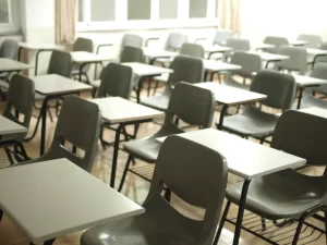 School desks with black chairs
