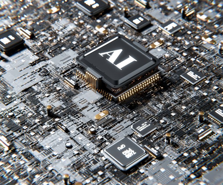 A button in the middle of a computer board states AI for artificial intelligence